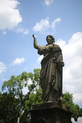 Woman Statue Monument in a Cemetery