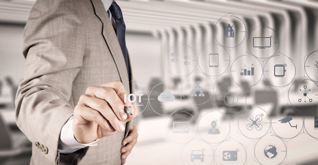 businessman hand writing in the whiteboard