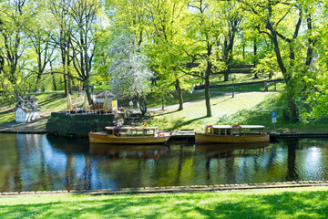 Pleasure boats on the pier of the Riga city canal