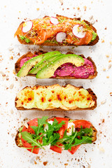 Assortment of healthy and colorful brunch toasts