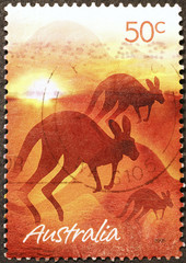 Kangaroo silhouettes at sunset on australian postage stamp