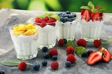 Yogurt and berry. Fresh fruit yogurt with fresh berries and peaches