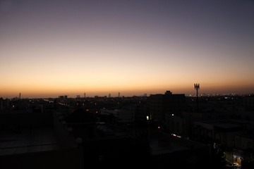 Fototapeta premium Sunset scene with buildings silhouette in countryside of Jeddah, Saudi arabia