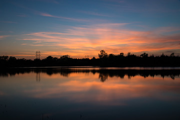 Fototapeta na wymiar Lakeside Summer Sunset