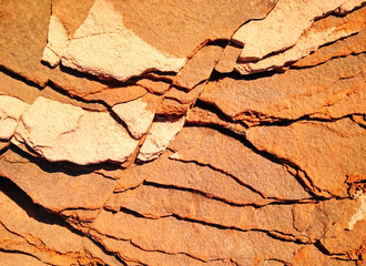 Top view of sandy rock formation. Layered texture. Abstract background