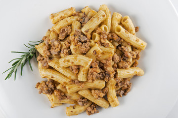Plate of macaroni pasta with Bolognese ragù