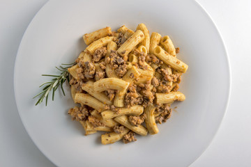 Plate of macaroni pasta with Bolognese ragù