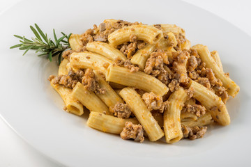 Plate of macaroni pasta with Bolognese ragù