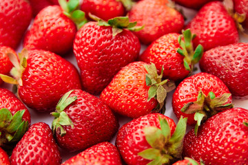 background from freshly harvested strawberries. Top view. red berry.
