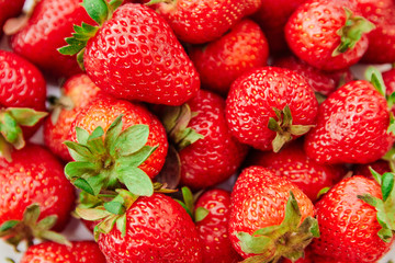background from freshly harvested strawberries. Top view. red berry.