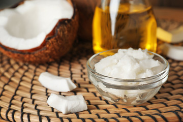 Bowl with coconut oil on table. Healthy cooking