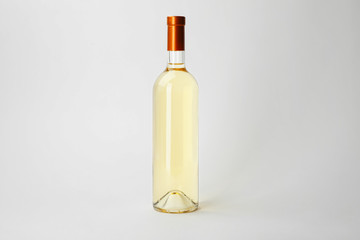 Bottle of expensive wine on white background