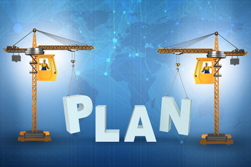 Plan and strategy concept with crane lifting letters