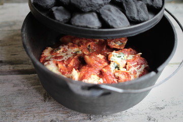 Cast Iron Pasta Stuffed Shells Dinner On Wooden Background