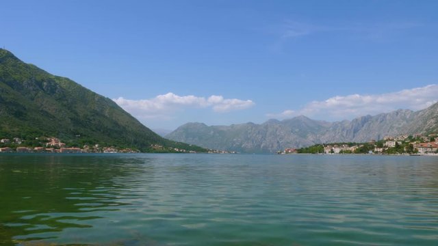 The bay is framed by mountains