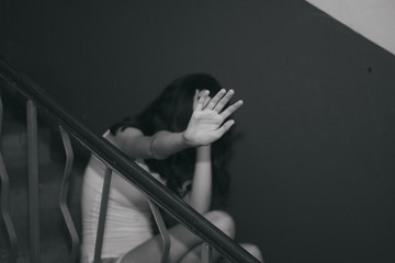 Female slavery in an abandoned building, ending violence against women, international women's day.