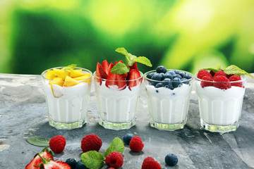 Yogurt and berry. Fresh fruit yogurt with fresh berries and peaches