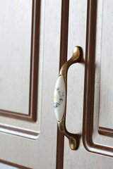 One handle of cabinet door close-up