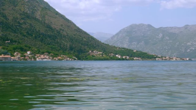 Sea surface and mountains in the background