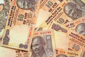 A close up image of Indian 10 Rupee notes 