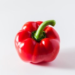 group of red ripe organic bell pepper  isolated on white. copy space
