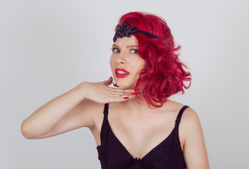 woman gesturing with hand to stop talking, cut it out