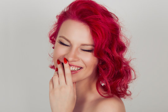 cheerful girl with a beautiful face and attractive amile