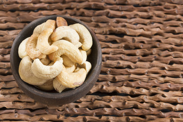 Cashew nuts on wooden background - Anacardium occidentale