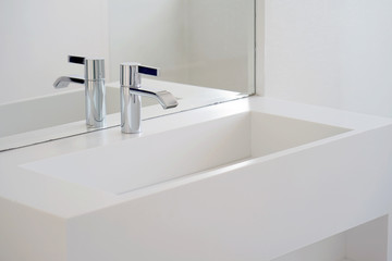Bathroom interior sink with modern design. Interior of bathroom with washbasin and faucet