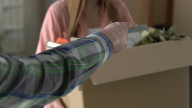 Father expelling disobedient daughter from room, family misunderstanding quarrel