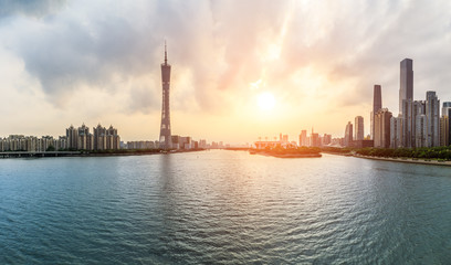 Fototapeta na wymiar Guangzhou,China modern city skyline panorama on the zhujiang river at sunset