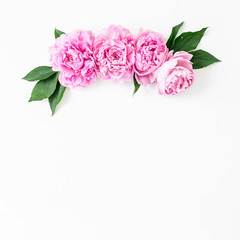 Floral composition of pink peonies flowers and petals on white background. Flat lay, Top view. Valentines day composition