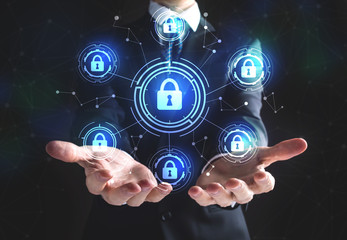 Cyber Security with businessman on a black background 