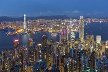 Fototapeta na wymiar Panorama of Victoria harbor of Hong Kong City at dusk
