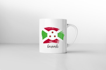 Burundi flag souvenir mug on white background. 3D rendering.