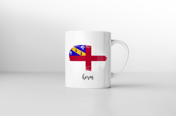 Obraz premium Herm flag souvenir mug on white background. 3D rendering.