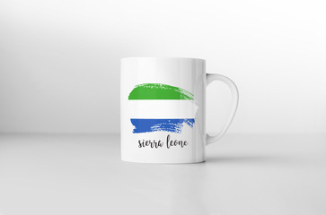 Sierra Leone flag souvenir mug on white background. 3D rendering