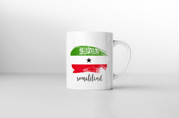 Somaliland flag souvenir mug on white background. 3D rendering.