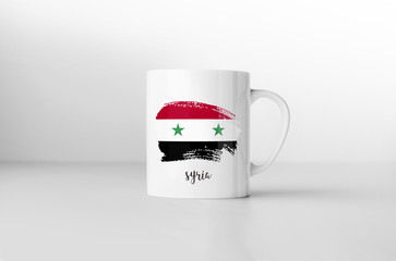 Syria flag souvenir mug on white background. 3D rendering.