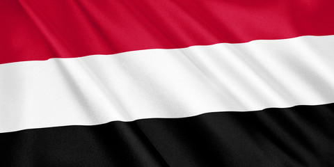Obraz premium Yemen flag waving with the wind, wide format, 3D illustration. 3D rendering.