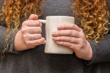 Coffee Cup in Hand