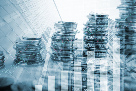 Double exposure rows of coins with common Modern business skyscrapers. for finance and business,Saving money and account finance bank business concept.