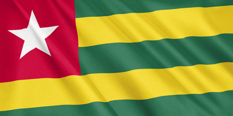 Togo flag waving with the wind, wide format, 3D illustration. 3D rendering.