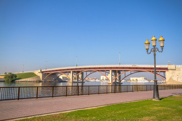 Fototapeta na wymiar Sharjah corniche park with beautiful greenery and cornice bridge