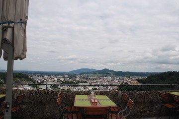 Fototapeta na wymiar View of Salzburg from above in outdoor restaurant