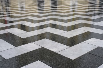 Tiled flooring with reflection of cathedral