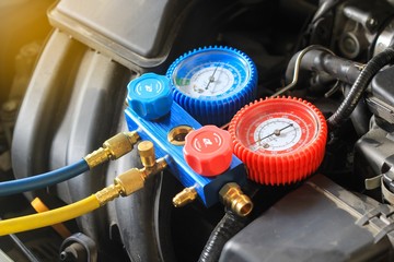 Equipment for service car air conditioner, close up monitoring tools car air of car garage.