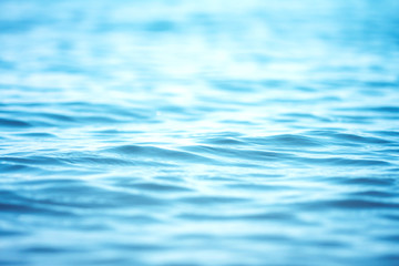 Blur beautiful shiny sparkling  tropical blue sea beach , the fresh summer background .