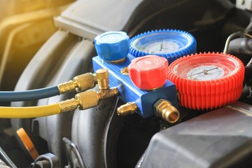 Equipment for service car air conditioner, close up monitoring tools car air of car garage.