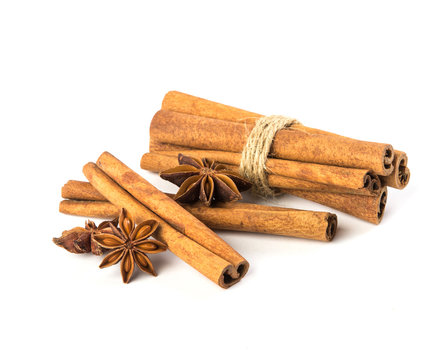 Close up the brown cinnamon stick with star anise spice isolated on white background , overhead and top view
